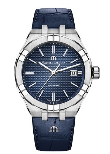 AIKON AUTOMATIC MET DATUM 42MM.
Stedelijk geïnspireerde, eigentijdse esthetiek, ergonomisch ontwerp en een mechanisch hart maken dit de ideale aanvulling op het stadsleven. Met zijn speelse gebruik van contrasten en vormen maakt de AIKON Automatic een krachtig statement.
Diameter 42 mm. Stainless Steel. Saffierglas ontspiegeld. Open achterkant met ontspiegeld Saffierglas. Schroefkroon. 20 ATM waterdicht. Uurwerk Caliber ML115 gangreserve 38 uur.
Blauw Kalfsleren band met vlindersluiting.